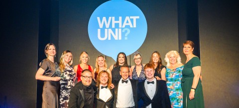 Group of people celebrating award win