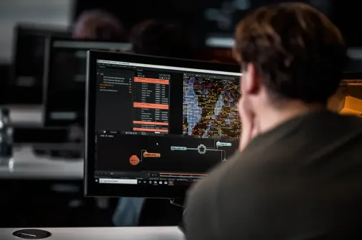 man looking at screen