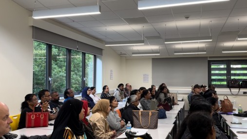 Mixed group of students seated in classroom