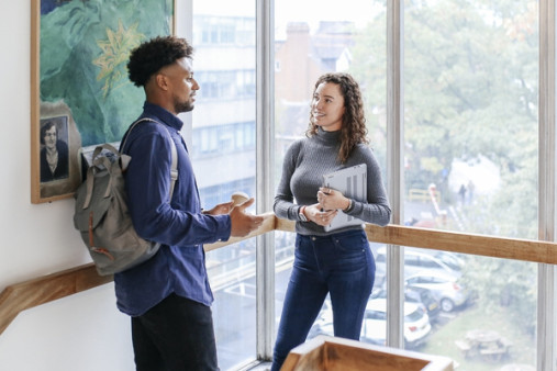 Students talking standing up