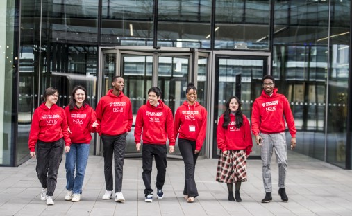 Group of students in branded red sweatshirts