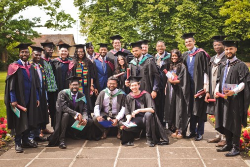 A group of people in graduation gowns