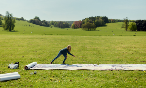 Student paints on field