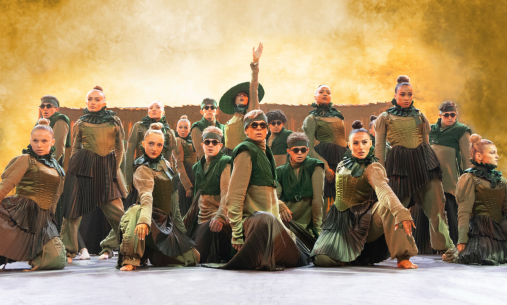 Performers with gold background 'Ark Angel'