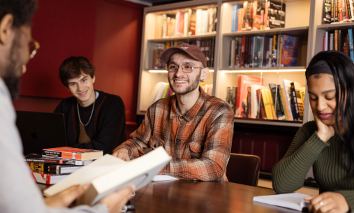Four students studying at a table