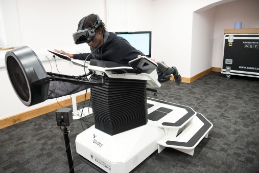 Man testing Buckingham Birdly machine